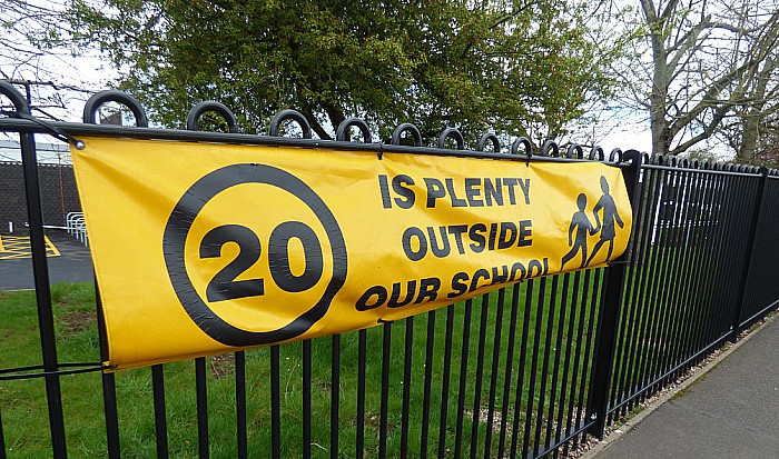 20 is Plenty banner outside school - limits - pic by Elliott Brown under creative commons licence