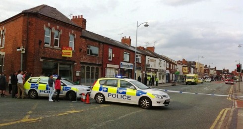 Nantwich Road sealed off with man on roof - pic by Dave Vernon