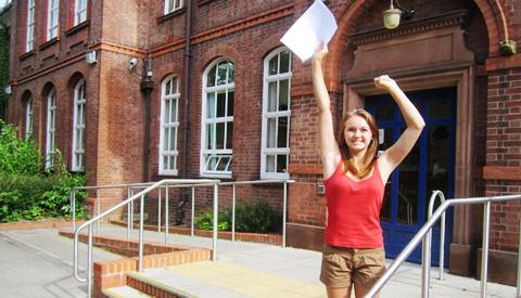 Alex Leigh celebrates outside Malbank School