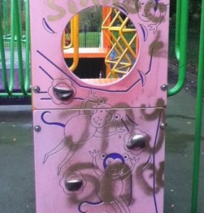 graffiti on play equipment at Joey the Swan park