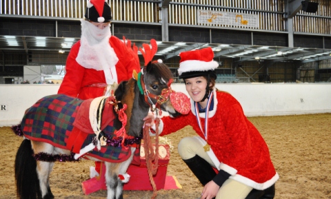 Amy Holmes, Chloe Lewis and Star, winners of the fancy dress