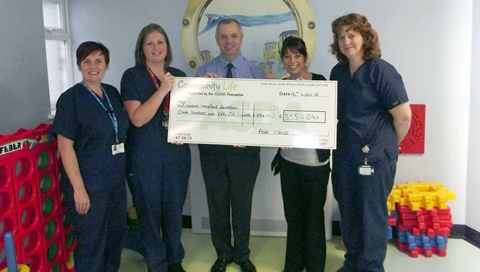 Asda Crewe donates money for Leighton Hospital toys