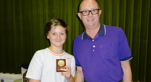 Junior winner Jack Whalley receives his shield from Alastair Bain WJTC Chairman