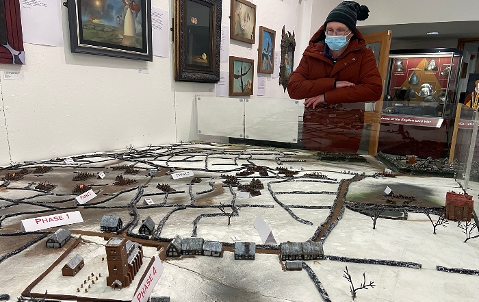 Nantwich Museum - Visitor Christopher White views the Battle of Nantwich scale-model (1)