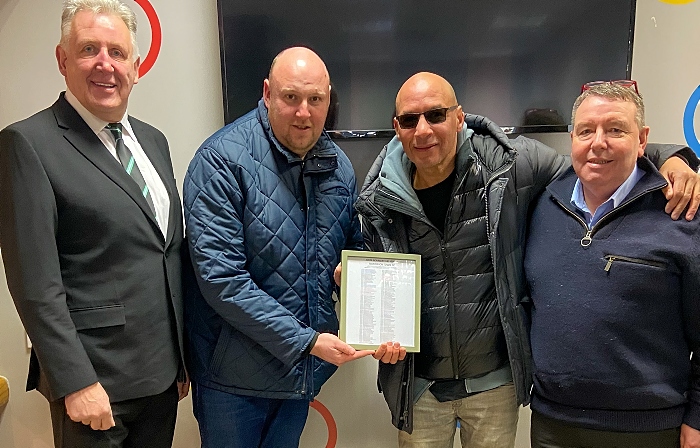 Dabbers legend John Scarlett (centre wearing glasses) receives framed record of his goalscoring feats (1)