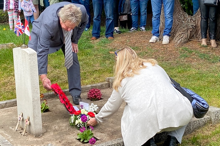 Graveside service - Russell Ellison-Jones lays wreath and Dawn Hughes lays flowers (1)