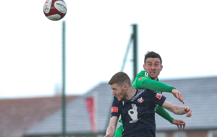 Second-half - Matt Bell rises highest to win the ball (1)