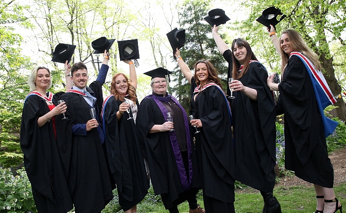 Equine Science and Sports Performance grads hats raised (1)