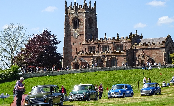 Mini car owners prepare to be interviewed during a classic car parade (1)