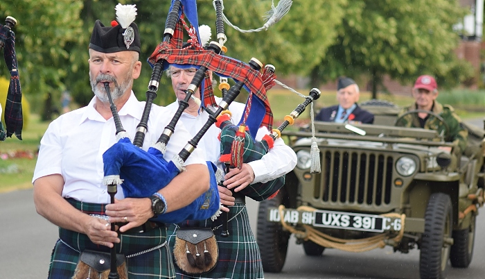 Royal British Legion Pipe Band leads special guest Sergeant Bernard Morgan in Jeep (1)