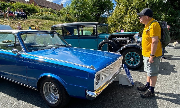 Visitor Mark Ray views a Dodge Dart GT at The Red Lion (1)