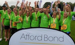 Nantwich firm Afford Bond helps raise £4,500 at Triathlon