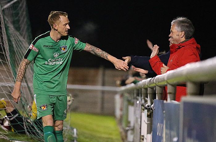 2nd goal - Steve Jones celebrates with a fan