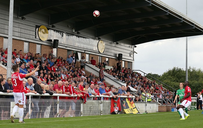 A Wrexham throw in in front of the Baker Wynne and Wilson Stand