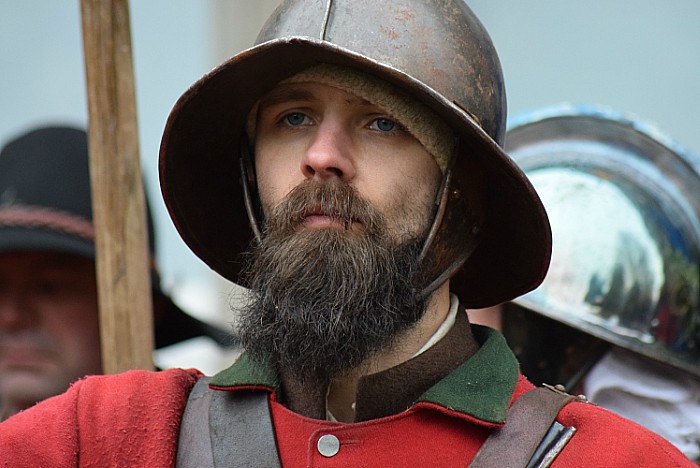 A pikeman prepares for inspection outside St Marys Church Nantwich