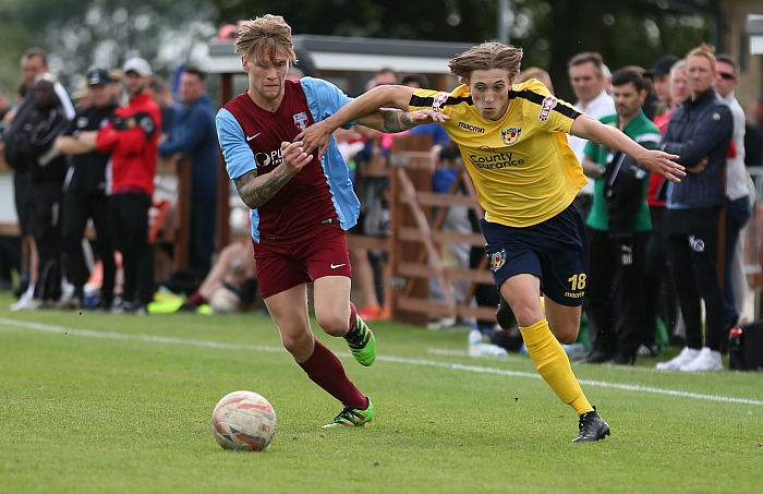 Sandbach United v Nantwich - Aaron Hassall eyes the ball