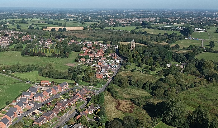 aerial view above tower and the village of wybunbury