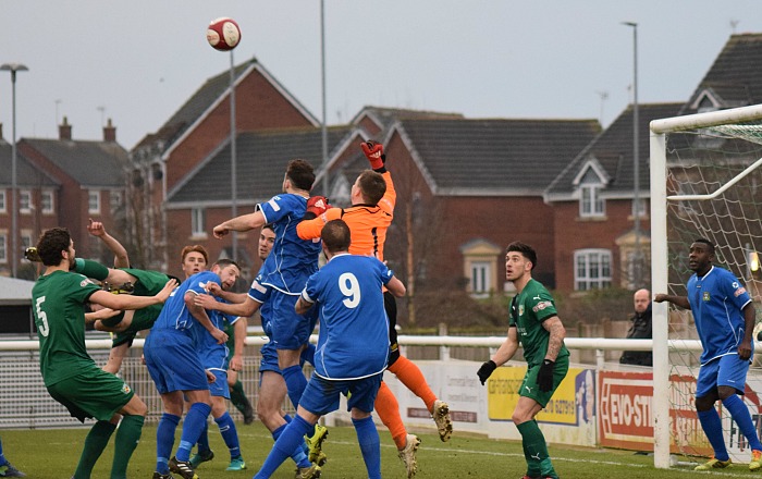 Barwell FC prepare to clear a Nantwich corner