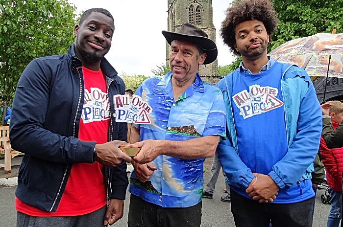 CBBC - Inel receives the All Over the Place trophy from Mark Walker Chairman Wybunbury Tower Preservation Trust for defeating an unhappy Johnny (1)