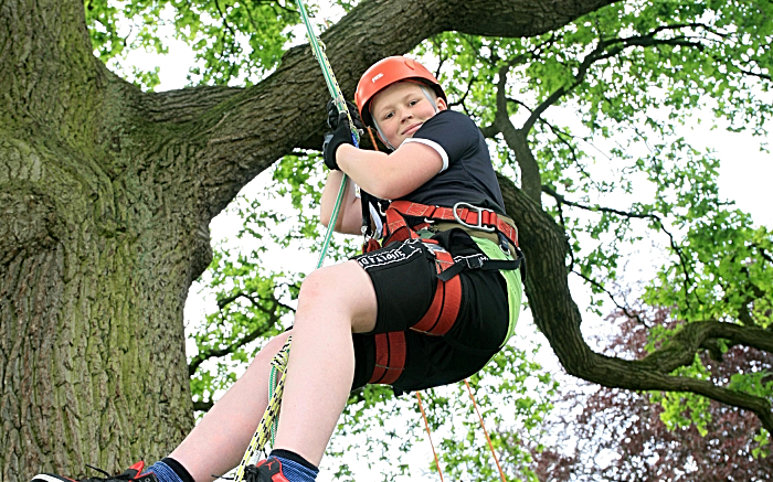 Callum Moore, aged 11, tries tree climing (1)