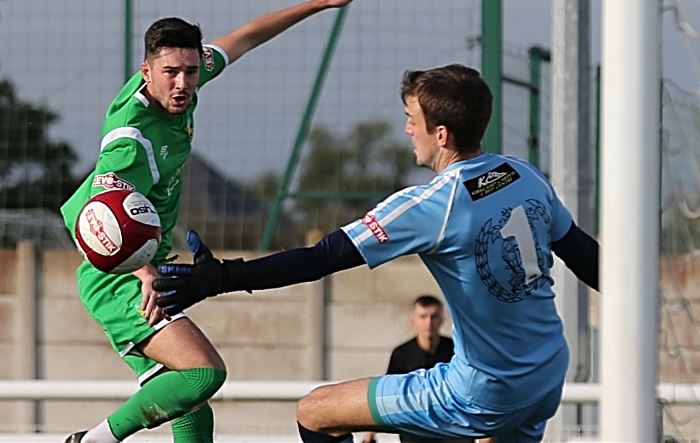 Callum Saunders effort is saved by Workington keeper Aaron Taylor (1)