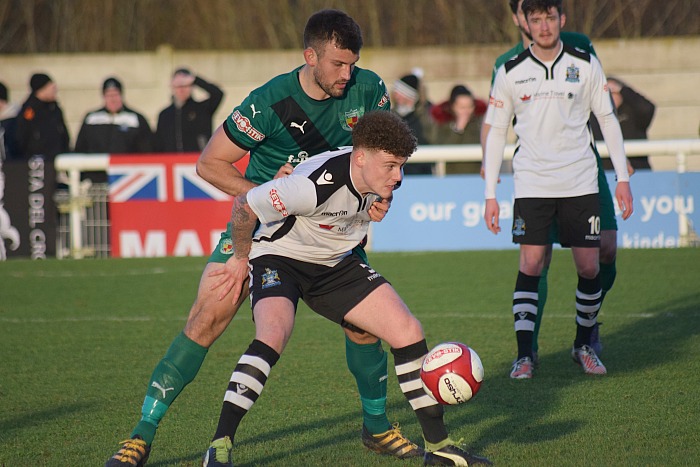 Captain Sam Hall eyes the ball