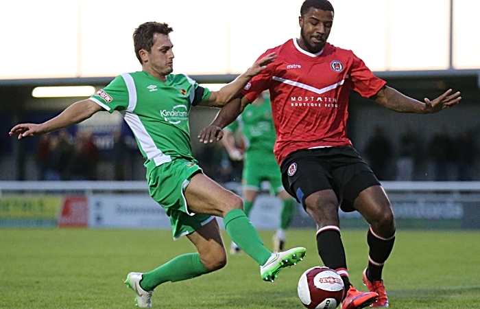 Caspar Hughes challenges for the ball (1)