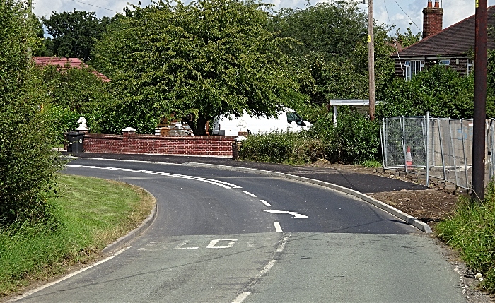 Change in road surface near Brydson Crescent at Bellway Kingfisher Reach housing development (1)