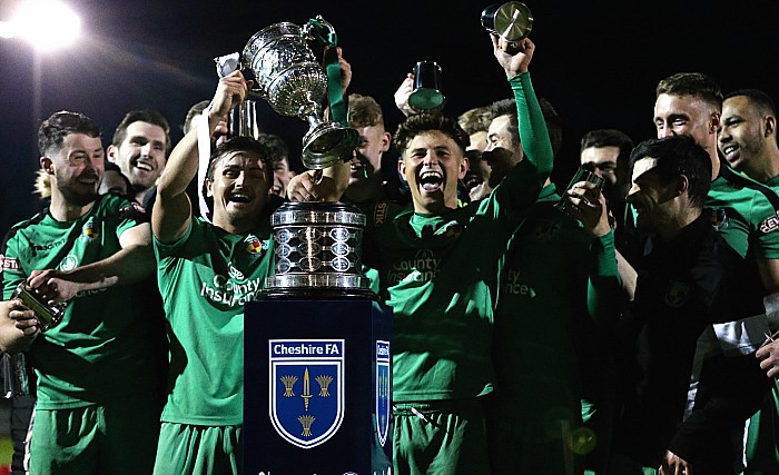 Cheshire FA Senior Cup winners presentation - captain Caspar Hughes lifts the trophy