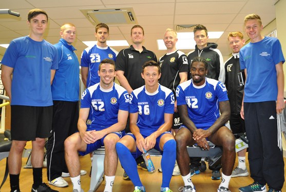 Crewe Alexandra players, students, staff in gym at Reaseheath College