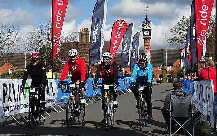 Sportive - Cyclists cross the finish line within Queens Park Crewe