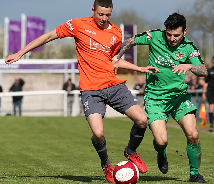 Danny Griggs challenges for the ball