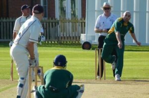 Darren Cook bowling for Toft CC