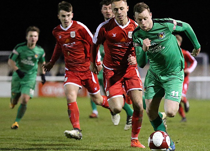 Dave Forbes takes the ball forward