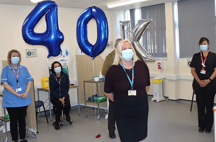 Denise Frodsham (front centre) thanks the team after reaching 40k vaccinations (1)