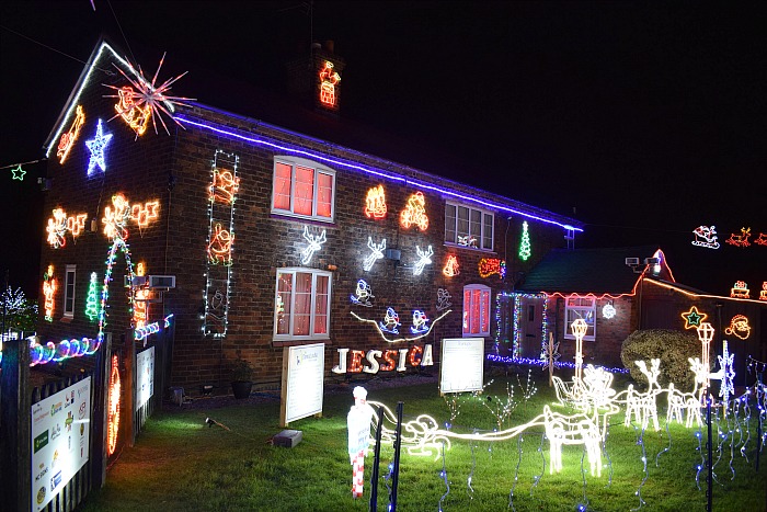 farm-building-with-jessica-in-lit-up-letters