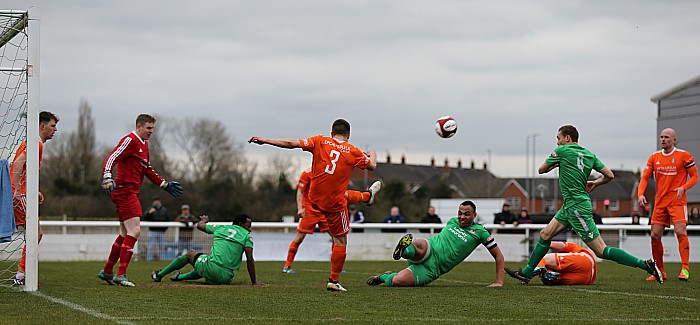 Farsley Celtic clear the ball