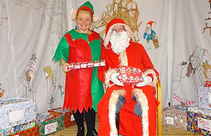 Father Christmas and elf helper