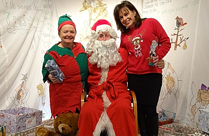 Father Christmas and helpers at his Grotto - Xmas Fair