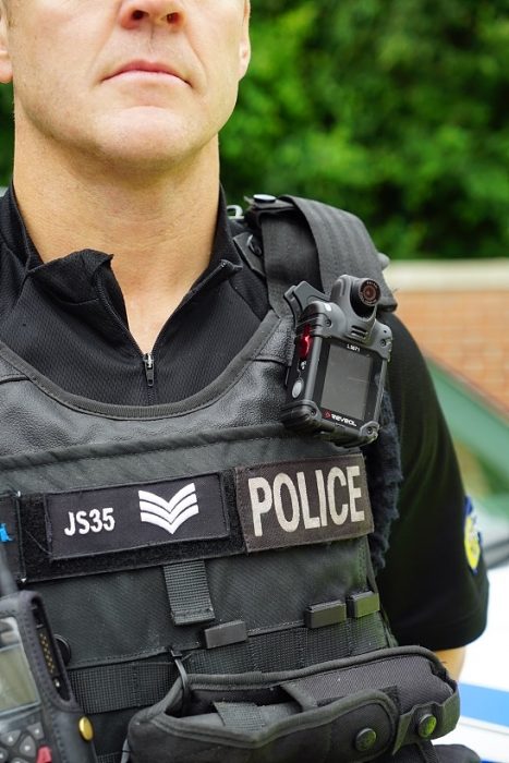 Firearms officer wearing body worn video camera