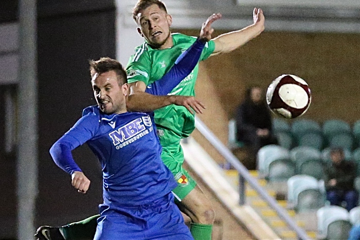 First-half - David Webb fights for the ball (1)