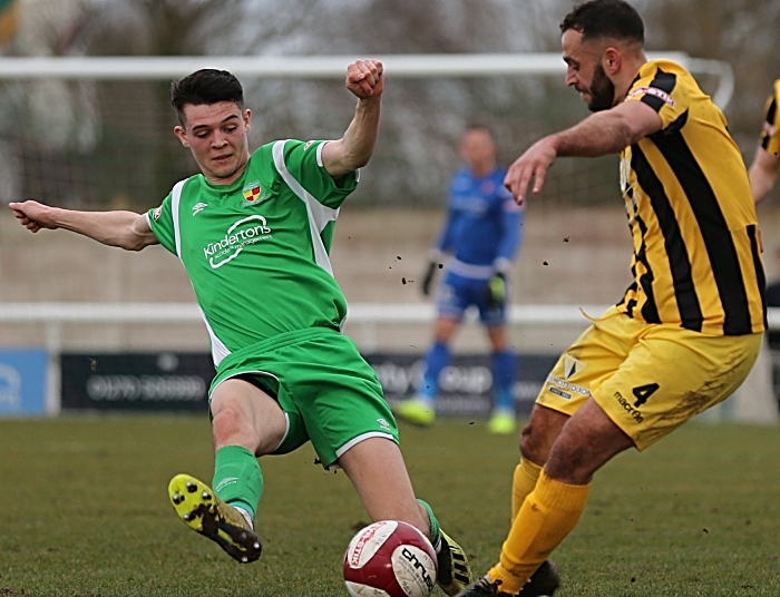 First-half - Joe Malkin fights to win the ball (1)