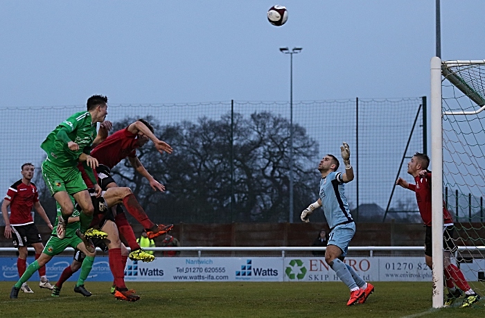 First-half - Joe Malkin rises to head at goal (1)