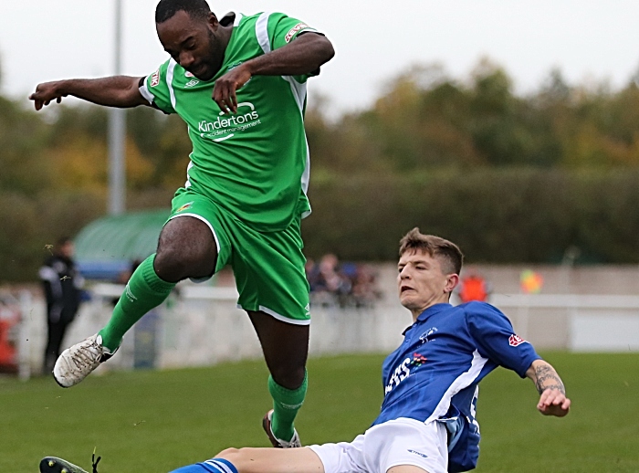 First-half - Joe Mwasile is tackled for the ball