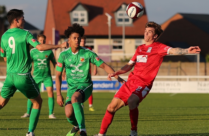 First-half - Joe Thompson and Stafford Rangers player eye the ball (1)