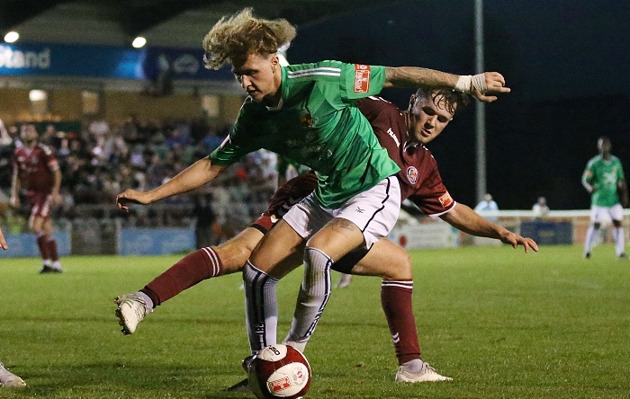 First-half - Luke Walsh on the ball under pressure from Hyde (1)