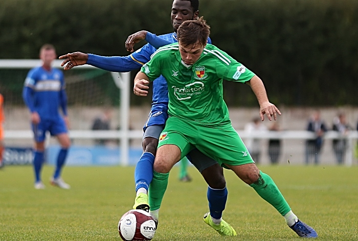 First-half - Sean Cooke eyes the ball under pressure (1)