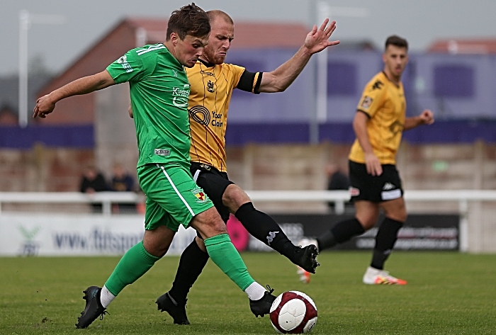 First-half - Sean Cooke on the ball under pressure from Southport (1)