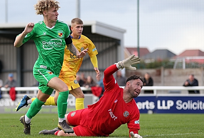 First-half - second Nantwich goal - Luke Walsh dinks it over the onrushing Lancaster keeper Samuel Ashton(2) (1)