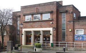 Roads re-open after police talk man down from former Crewe baths roof